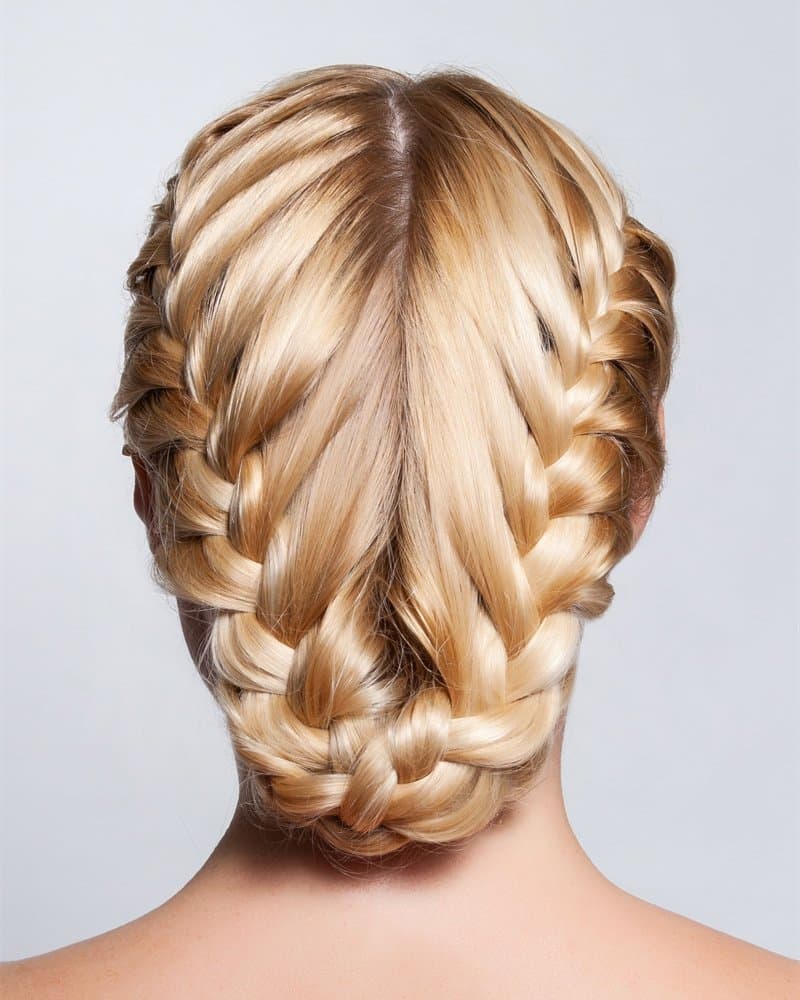 A braided bridal updo at Servanté Studio