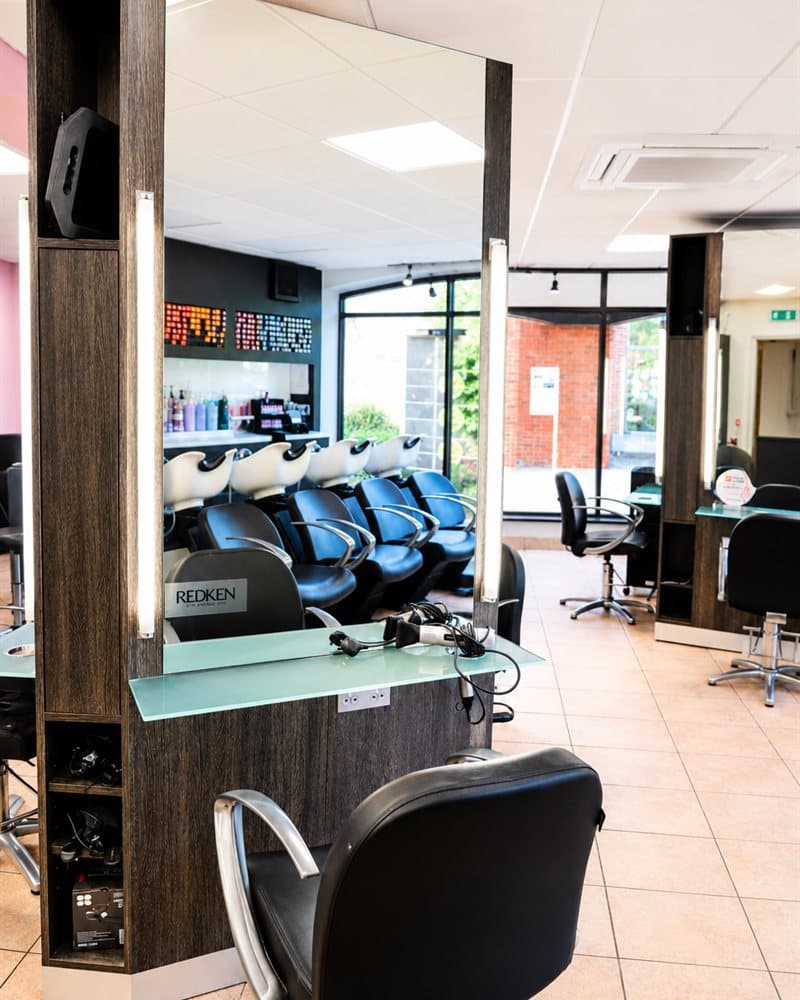 A mirrored styling station at Servanté Studio