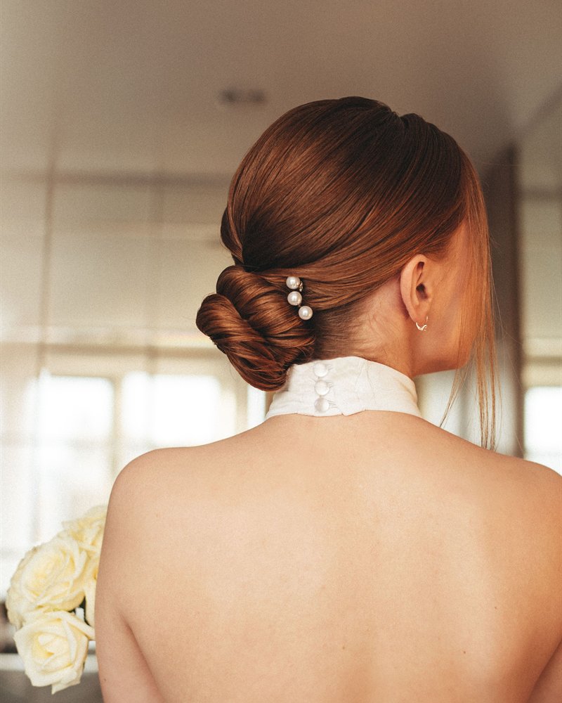 A pearl-set bridal chignon at Servanté Studio