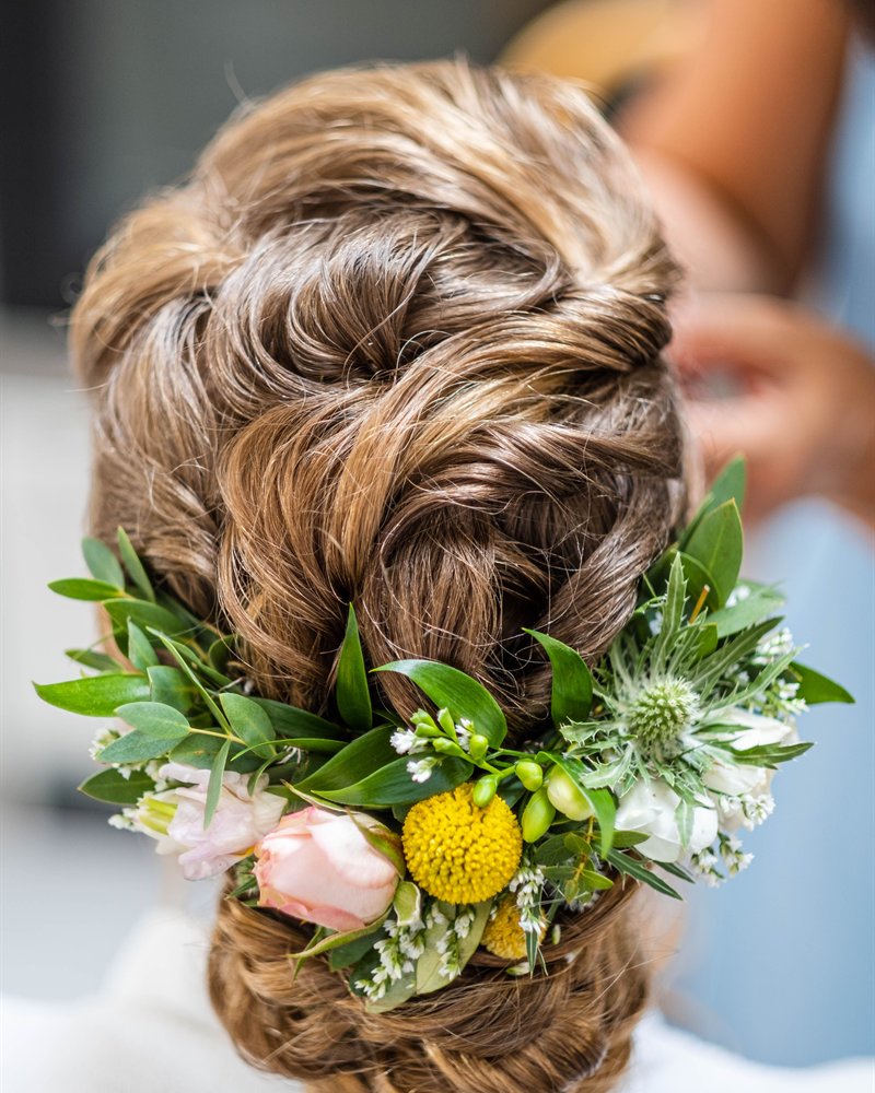 A floral bridal updo at Servanté Studio