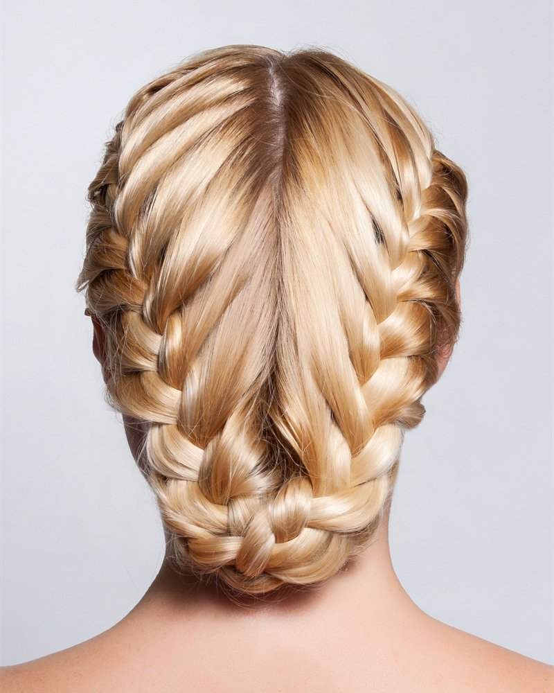 A braided bridal updo at Servanté Studio