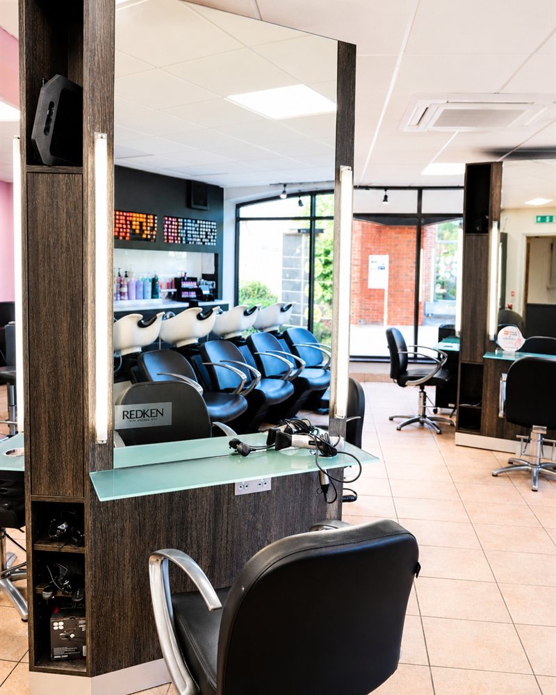 A mirrored styling station at Servanté Studio