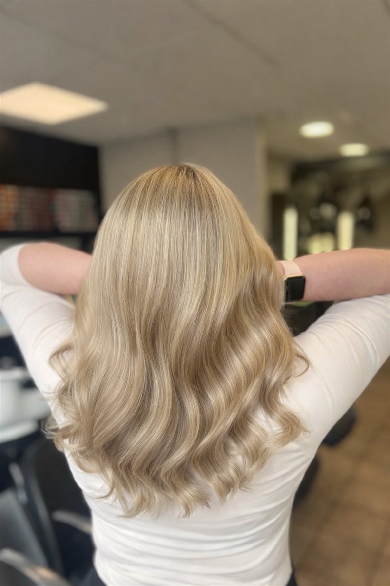 Clean, even blonde after a full lift and tone