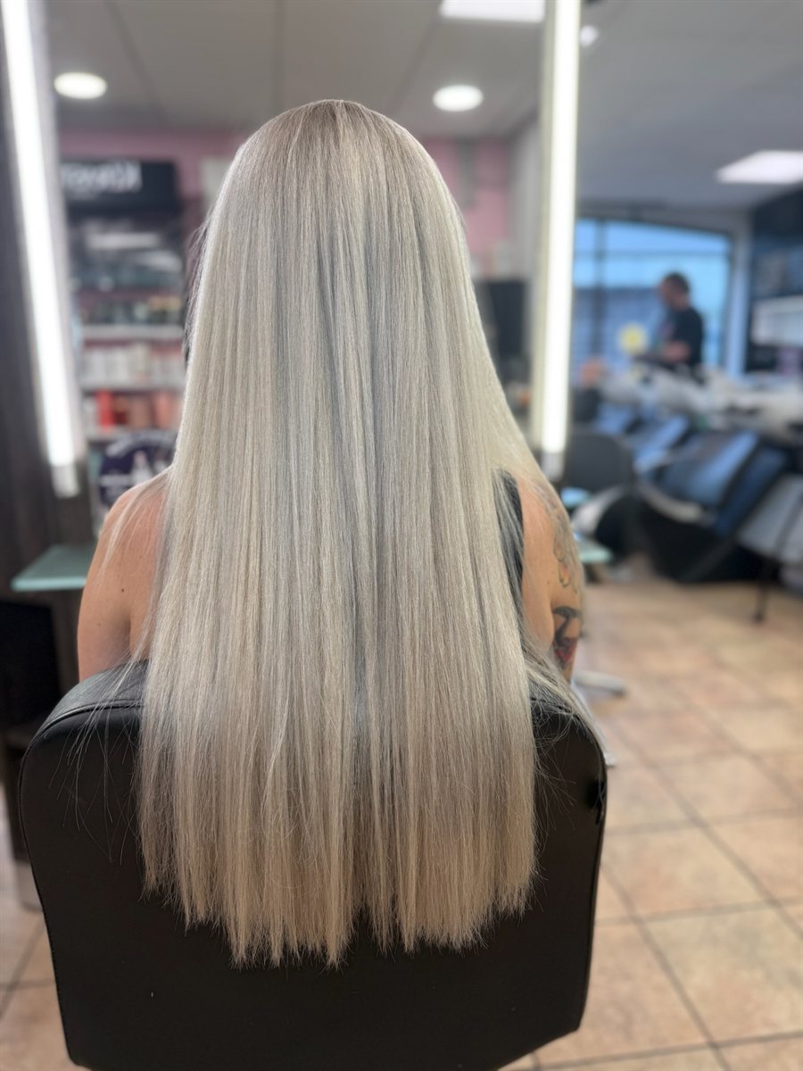 Bright, even blonde after a scalp bleach and tone